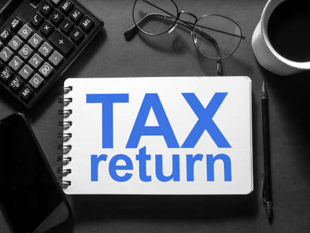 Tax return, business motivational inspirational finance quotes words typography lettering conceptの写真素材