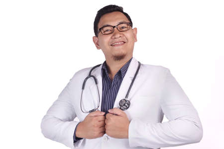 A Young Asian doctor with eyeglass Smiling Confident posing and looking at cameraの写真素材