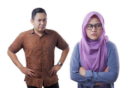 Asian muslim couple having bad relation,husband and wife arguing in family conflictの写真素材