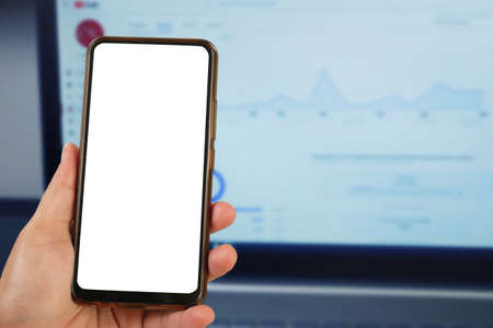 Close up image of smart phone mockup, businessman holding phone with white screen template