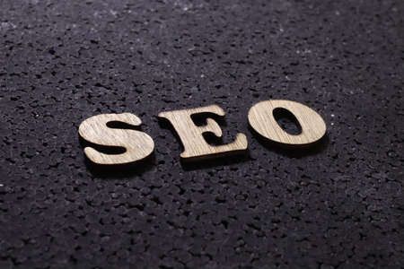 SEO Search Engine Optimization. Motivational internet business words quotes, wooden lettering...