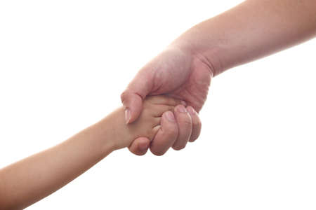 Close-up of child and adult person holding hands isolated on white