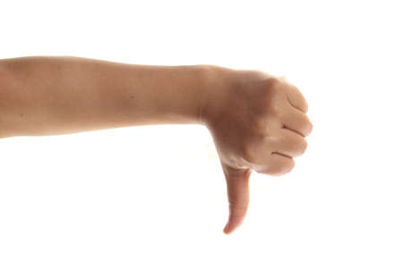 Thumb down hand gesture, isolated on white. Bad review conceptの写真素材