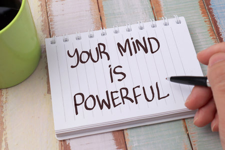 Your mind is powerful, text words typography written on book against wooden background, life and business motivational inspirational conceptの写真素材
