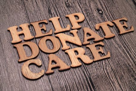 Help donate and share, text words typography written on wooden background, life and business motivational inspirational conceptの写真素材