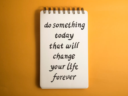 Do something today that will change your life forever, text words typography written on book against yellow background, life and business motivational inspirational conceptの写真素材