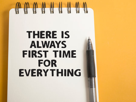 There is always firs time for everything, text words typography written on book against yellow background, life and business motivational inspirational conceptの写真素材