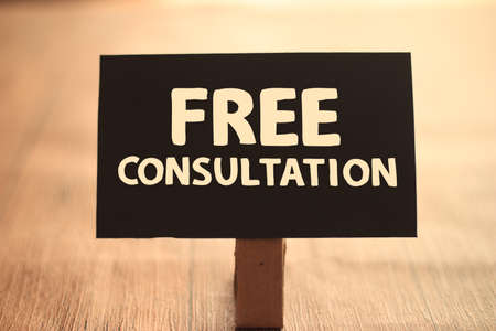 Free Consultation, text words typography written on paper, life and business motivational...