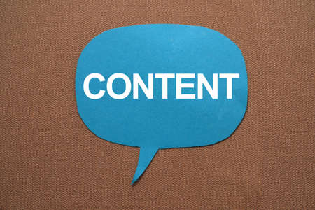 Content, text words typography written on paper against wooden background, life and business motivational inspirational conceptの写真素材