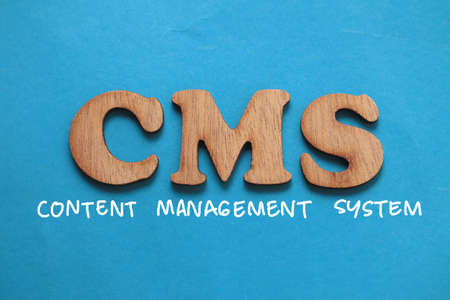 CMS Content Management System, text words typography written on blue background, life and business motivational inspirational conceptの写真素材