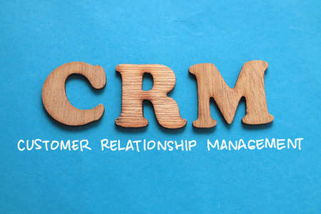 CRM Customer Relationship Management, text words typography written on blue background, life and business motivational inspirational conceptの写真素材