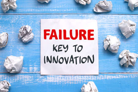 Failure is the key to innovation, text words typography written on paper against wooden background, life and business motivational inspirational conceptの写真素材