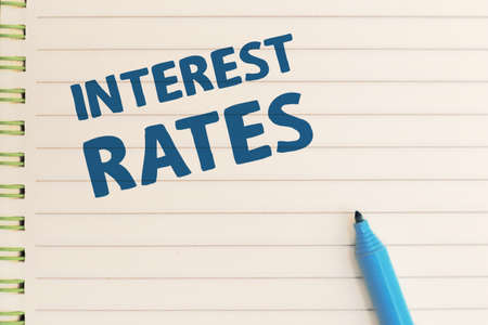 Interest Rates, text words typography written on paper, life and business motivational inspirational conceptの写真素材