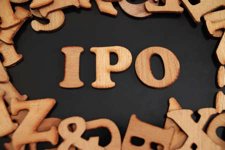 IPO Initial Public Offering, text words typography written on wooden background, life and business motivational inspirational conceptの写真素材