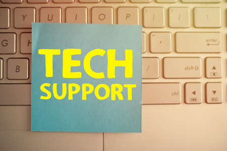 Tech Support, text words typography written on paper against computer keyboard, life and business motivational inspirational conceptの写真素材
