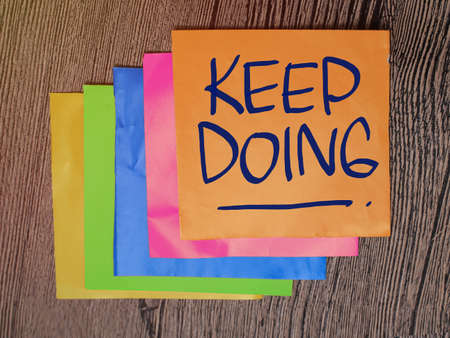 Keep Going, text words typography written on paper, life and business motivational inspirational conceptの写真素材