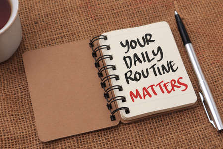 Your daily routine matters, text words typography written on note book, life and business motivational inspirational conceptの写真素材