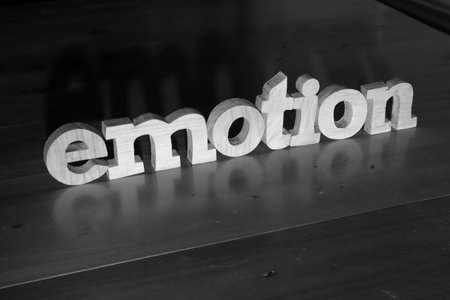 Emotion, text words typography written with wooden letter on black background, life and business negativity conceptの写真素材