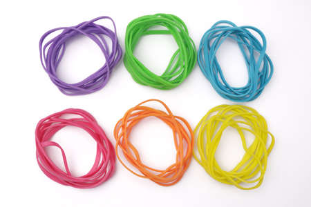 Colorful multi color elastic rubber bands isolated on white backgroundの写真素材