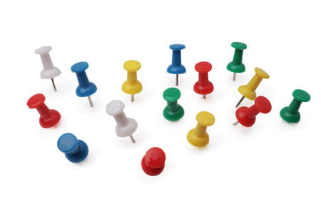 Colorful push pin thumbtack paper clip office business supplies isolated on whiteの写真素材