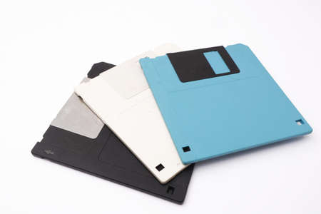 Retro vintage floppy disk diskettes on white background, old time computer storage equipment...