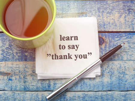 Learn to say thank you, text words typography written on paper,  life and business motivational inspirational conceptの写真素材