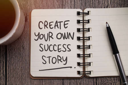 Create your own success story, text words typography written on paper, educational  life and business motivational inspirational conceptの写真素材
