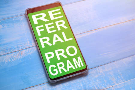 Referral Program, text words typography written on smart phone, success  life and business motivational inspirational conceptの写真素材