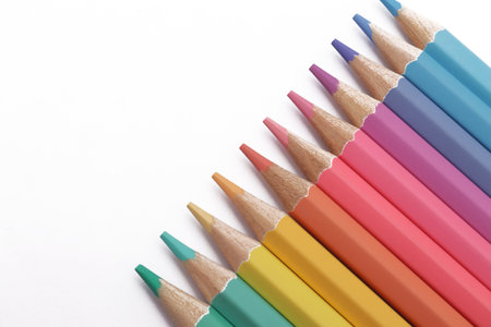 Close up of colorful colored pencils art education school supplies isolated on white backgroundの写真素材
