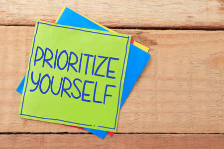 Prioritize yourself, text words typography written on paper, life and business motivational inspirational conceptの写真素材