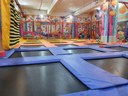 Samarinda, Indonesia. March 9 2021. Colorful empty children indoor playground, toys playing arcade arena in playtopiaの写真素材