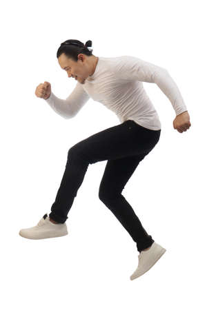 Asian man wearing grey shirt black denim and white shoes, jump flying levitation, happy expression....