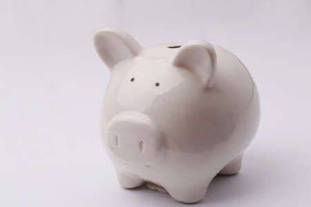 Close-up of piggy bank piggybank over white background, investment conceptの写真素材