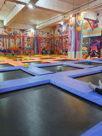 Samarinda, Indonesia. March 9 2021. Colorful empty children indoor playground, toys playing arcade arena in playtopiaの写真素材