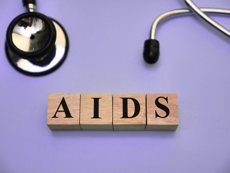 AIDS, text words typography written with wooden letter, health and medical conceptの写真素材