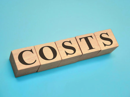 Costs, text words typography written with wooden letter, life and business motivational inspirational terms conceptの写真素材