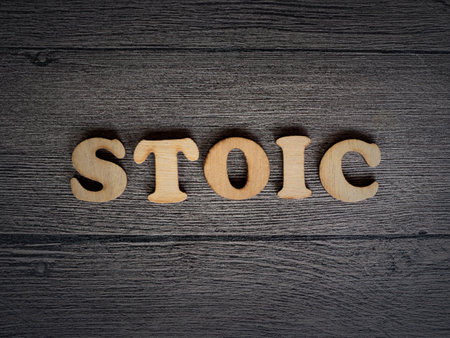 Stoicism word, stoic lifestyle concept, written on wooden letteringの写真素材