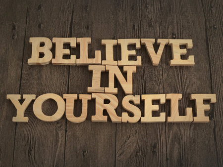 Believe in yourself, text words typography written with wooden letter, life and business motivational inspirational conceptの写真素材
