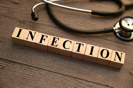 Infection, text words typography written with wooden letter, health and medical conceptの写真素材