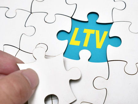 LTV Loan to Value or Life Time Value, text words typography written under jigsaw puzzle, life and business motivational inspirational conceptの写真素材
