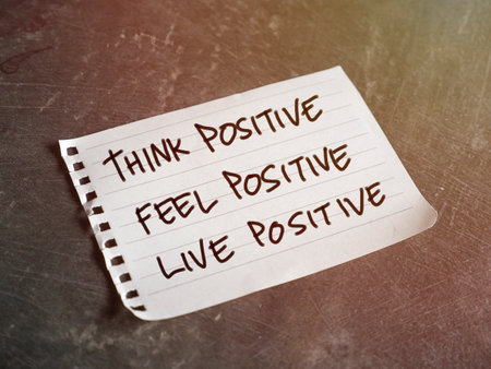 Think feel live positive, text words typography written on paper, life and business motivational inspirational conceptの写真素材