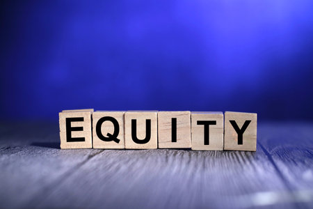 Equity, text words typography written with wooden letter on blue background, life and business motivational inspirational conceptの写真素材