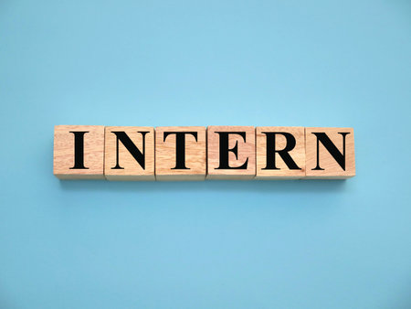Intern, text words typography written with wooden letter, life and business motivational inspirational conceptの写真素材