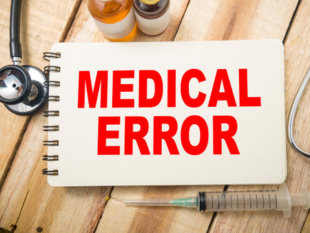 Medical error, text words typography written on paper, health and medical conceptの写真素材