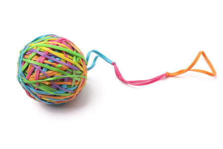 Colorful multi color elastic rubber bands ball isolated on white backgroundの写真素材