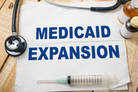 Medicaid expansion, text words typography written on paper, health and medicine conceptの写真素材