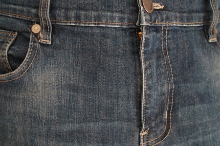 Close up of blue jeans zipper, Denim pant button and zippersの写真素材