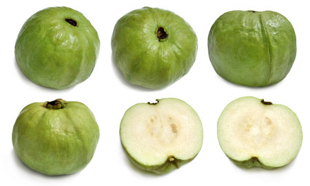 Guava, green organic ripe fresh exotic tropical fruit isolated cut out on whiteの写真素材