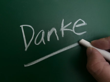 Danke, thank you in germany text words typography written on chalkboard, life and business motivational inspirational conceptの写真素材