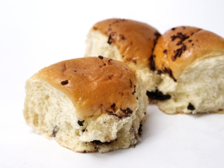 Roti sobek or kasur, soft sweet milk bun with chocolate sprinkle, isolated on whiteの写真素材